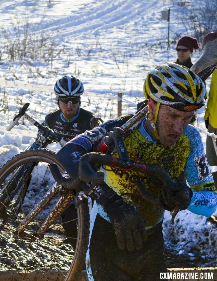 Adam Myerson leading Craig Etheridge over the barriers. © Cyclocross Magazine