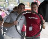 Mercury Cycling's Chris Mogridge and Challenge Tire's Stefano Lumbaco team up to hold Mercury's new 290g carbon disc rim down. © Cyclocross Magazine