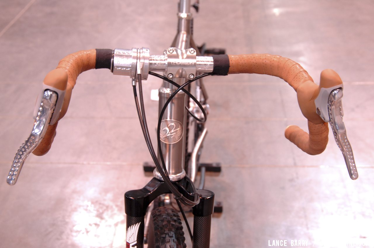 Flared drop bars remind us of Jacquie Phelan. Twenty2 Cycles\' titanium 650b belt drive, internally geared monster cross bike. © Lance Barry / Cyclocross Magazine