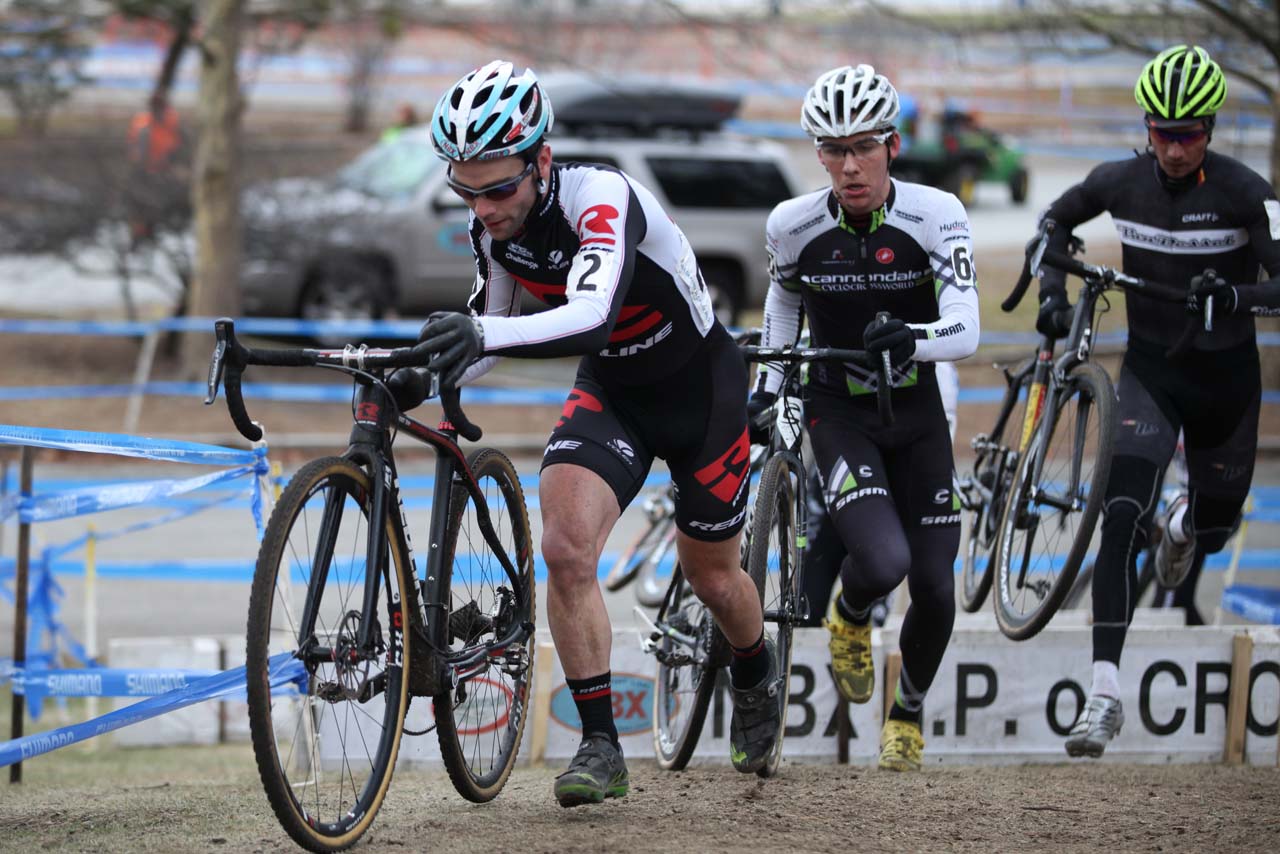 Lindine, White, and Garrigan tearing through the barriers. © Meg McMahon