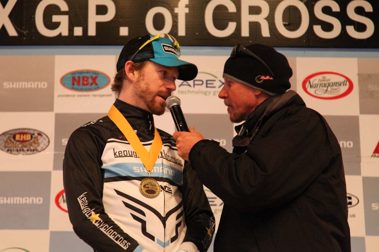 Shawn Milne discussing his series win with Richard Fries. © Meg McMahon