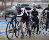 Lindine, White, and Garrigan tearing through the barriers. © Meg McMahon