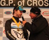 Shawn Milne discussing his series win with Richard Fries. © Meg McMahon