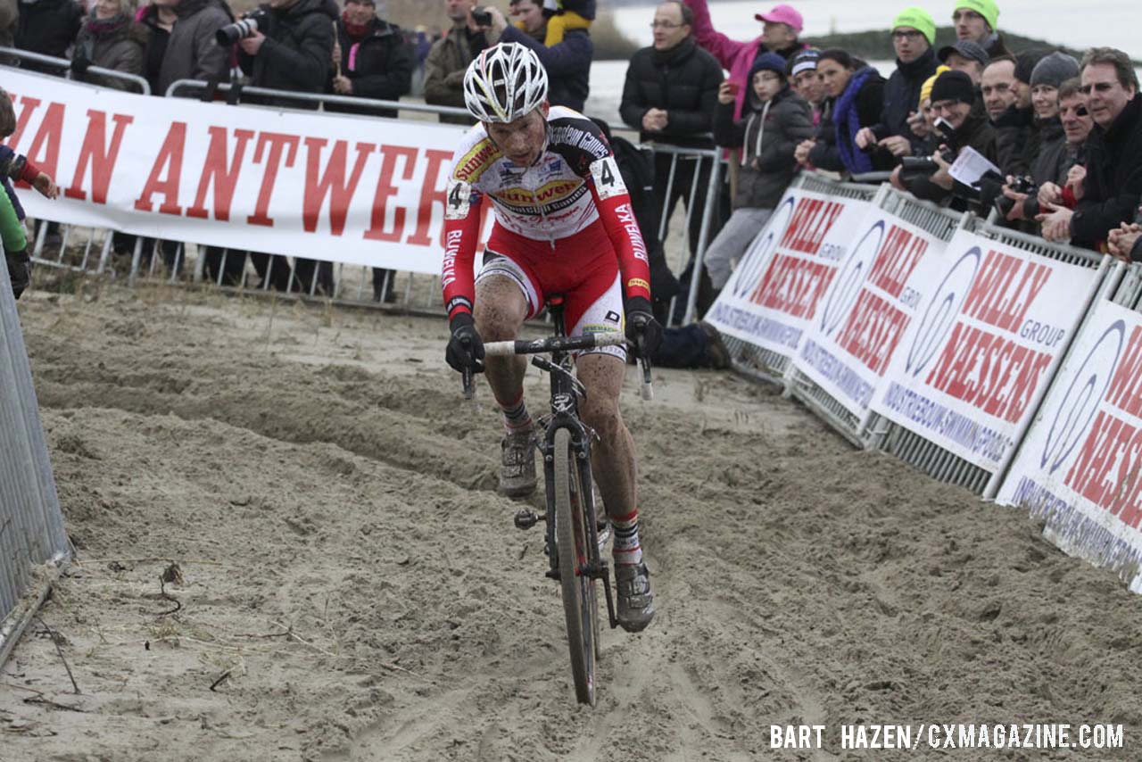 Kevin Pauwels (Sunweb-Napoleon Games) cornering through a sandy section. © Bart Hazen