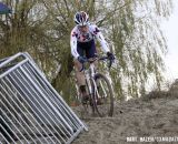 Katie Compton (Trek Cyclocross Collective) about to descend from the top of a sand berm. © Bart Hazen