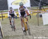 Nikki Harris (Young Telenet-Fidea) ahead of Katie Compton (Trek cyclocross Collective) early in the race. © Bart Hazen