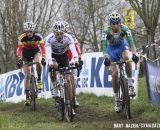 Sven Nys (Crelan-KDL), center, and lead riders crest one of the rollers. © Bart Hazen