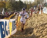 Katie Compton (Trek Cyclocross Collective) takes the low line to move up in position. © Thomas van Bracht