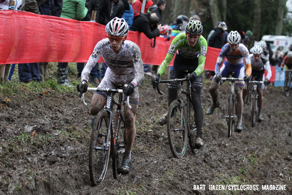 Lars van der Haar leads a group through the off-camber mud. © Bart Hazen / Cyclocross Magazine