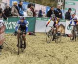 The Elite Women's podium finishers, (L-R) Helen Wyman, Sanne Cant, and  Sabrina Stultiens making their way through the sand. © Thomas van Bracht