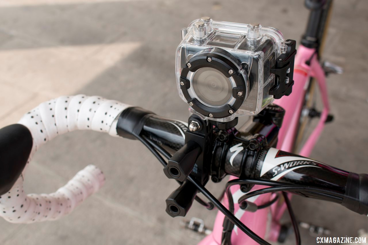 Looks like a GoPro, but it\'s an AEE handlebar camera, on Ana Rita Montenegro de Castro Vigario\'s bike.  Â© Cyclocross Magazine