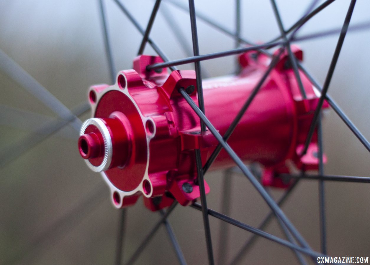Reynolds Cycling' 29 XC Carbon tubeless wheels have flashy red hubs that take 6-bolt rotors and straight pull spokes. Winter Press Camp 2014. © Cyclocross Magazine