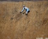 Tall grass makes for lonely stretches of riding. © Tim Westmore