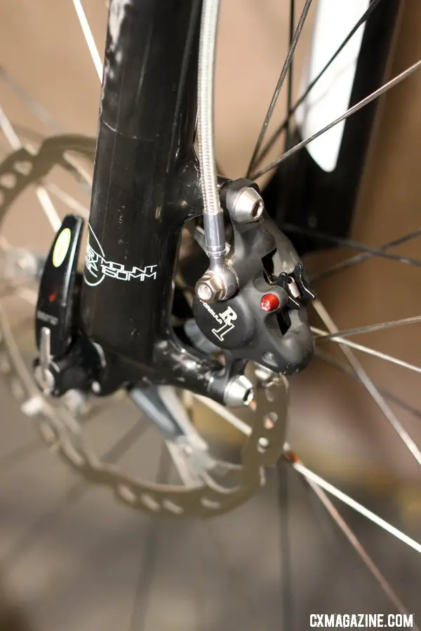 Summit Lab\'s 324 Brake Adapter lets cable-pull brake levers actuate a Formula R1 disc caliper. © Cylcocross Magazine
