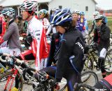 The elite women at Day 3 of Jingle Cross were shivering on the start line, trying to stay warm.  It was a windy, damp. cold day.  © Amy Dykema