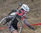Amanda Carey chooses the less muddy line up the hill.