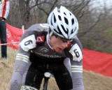 Tristan Schouten (Cyclocrossracing.com) blazing through an off-camber downhill turn. © Amy Dykema