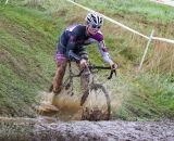 Peter Goguen hits the mud with a splash. © Todd Prekaski