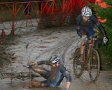 CXM&#039;s Josh Liberles (Corsa Concepts) bites the dust, or mud, while transitioning from slick corner to wooden bridge © Dave Roth