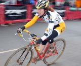 Roaring Mouse's Julie Bates flies through the course's first corner in the Masters Women's race. © Cyclocross Magazine