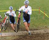 Donohue leads Durrin up the stairs. © Natalia Boltukhova | Pedal Power Photography | 2011