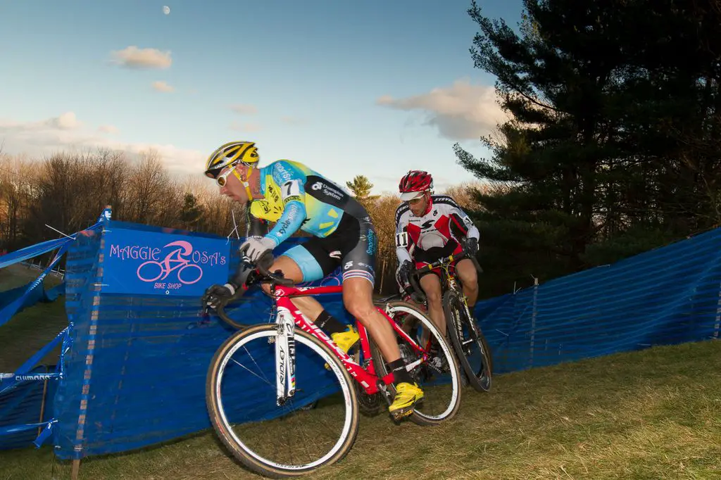 Myerson and St. John on a challenging off-camber as the sunlight wanes. © Todd Prekaski