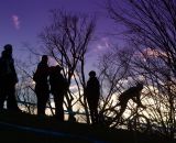 Spectators watch from atop a ridge as Durrin rides to his first UCI win. © Todd Prekaski