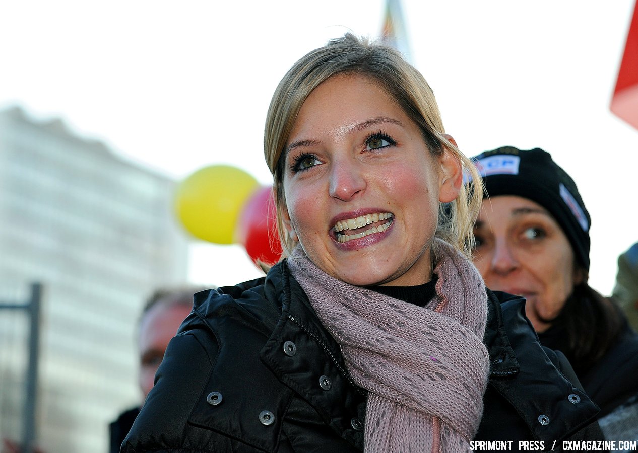 Niels Albert \'s wife celebrates as her husband become Belgian Champion after winning the men elite 2011 Belgian Championship cyclo cross race in Antwerpen. Niels Albert is the 2011 Belgian Champion. Sunday Jan. 9, 2010. ( SPRIMONT PRESS / Laurent Dubrule )