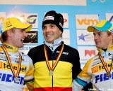 Bart Wellens (2nd), Niels Albert Winner and Kevin Pauwels (3rd) on the podium of the 2011 Belgian Championship cyclo cross race in Antwerpen. Sunday Jan. 9, 2010. ( SPRIMONT PRESS / Laurent Dubrule )
