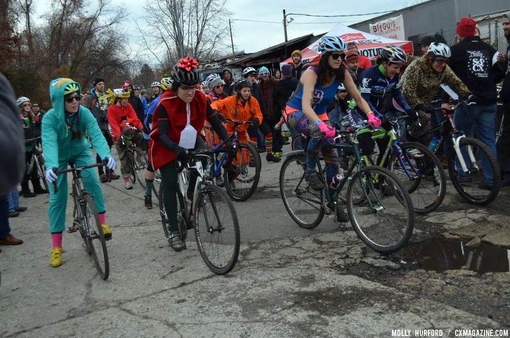 The (heavily costumed) women\'s start at Bilenky Junkyard Cross. © Cyclocross Magazine