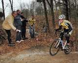 Cowbells ring as Rochester Bike Shop rider Adam Naish races through the woods ? Andrea Tucker 2009