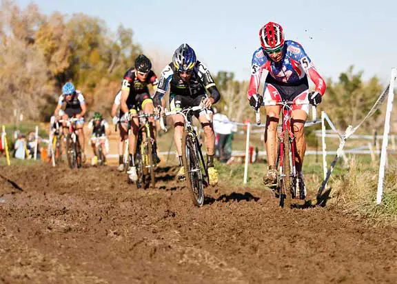 The lead group battling thru the mud on the back portion of the course. © 2011 Jody Grigg