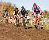 The lead group battling thru the mud on the back portion of the course. © 2011 Jody Grigg