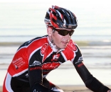 Brent Prenzlow climbs the bluff above the Pacific Ocean on the final lap at Storm the Beach 2009. ? Richard Murphy