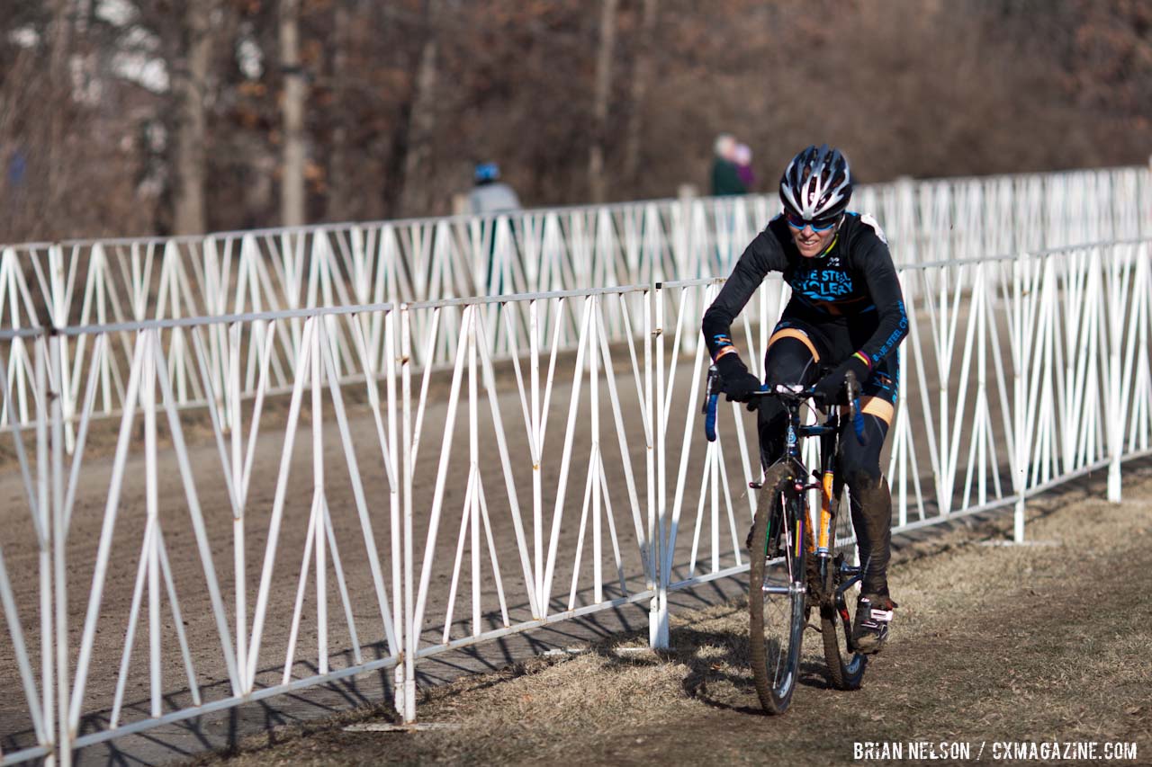 Kathy Savari heading for the top of the podium.  ©Brian Nelson