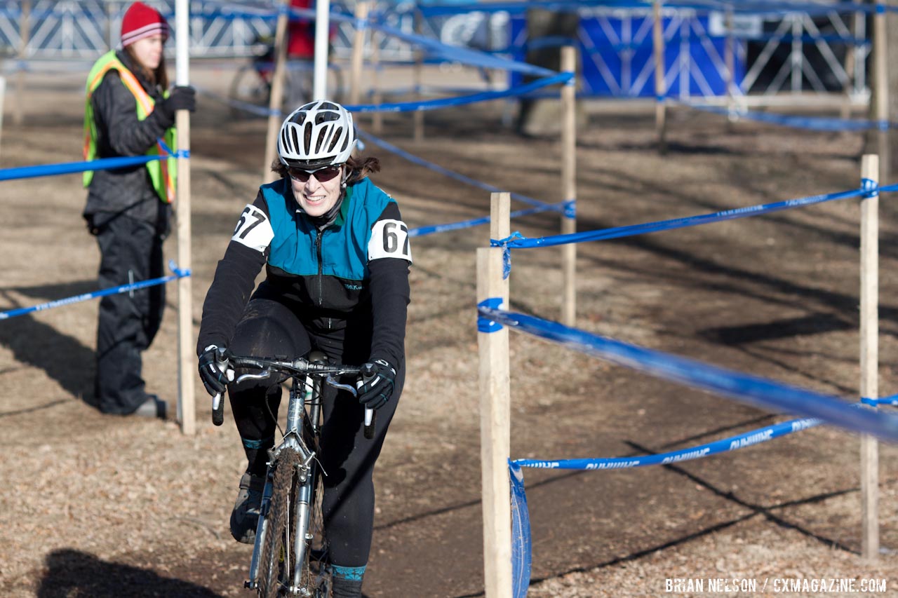 Julie O\'Neil on her way to the top step.  ©Brian Nelson