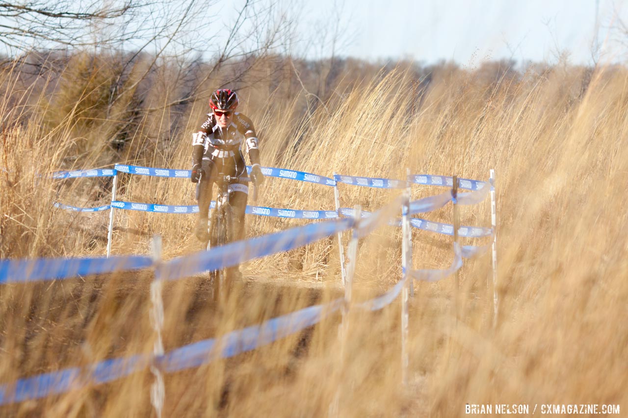 Mellisa Putzer in the tall grass.  ©Brian Nelson