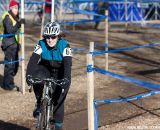 Julie O'Neil on her way to the top step.  ©Brian Nelson