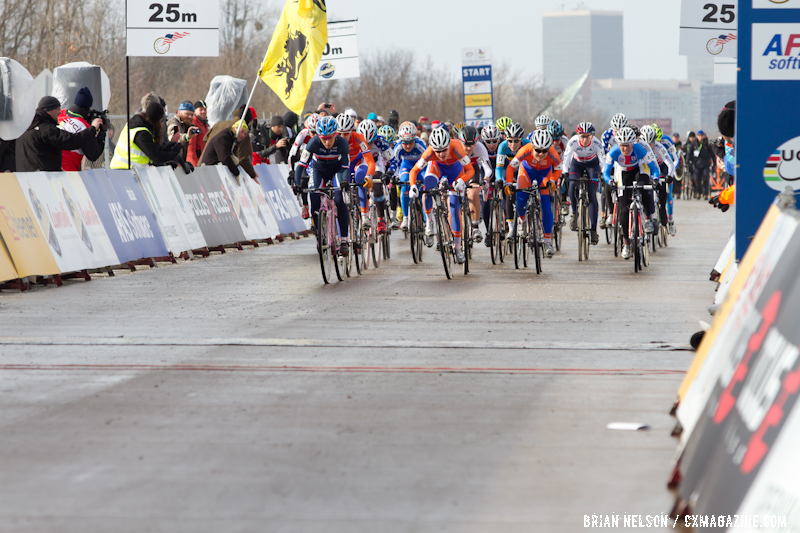 The women charge at the start with Lucie Chainel-Lefevre taking the holeshot at the Elite World Championships of Cyclocross 2013. © Brian Nelson
