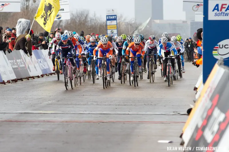 The women charge at the start with Lucie Chainel-Lefevre taking the holeshot at the Elite World Championships of Cyclocross 2013. © Brian Nelson