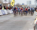 The women charge at the start with Lucie Chainel-Lefevre taking the holeshot at the Elite World Championships of Cyclocross 2013. © Brian Nelson