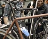 Attendees check out Bruce Gordon's favorite personal bike, his carbon and titanium 650b mixed terrain bike. ©Cyclocross Magazine