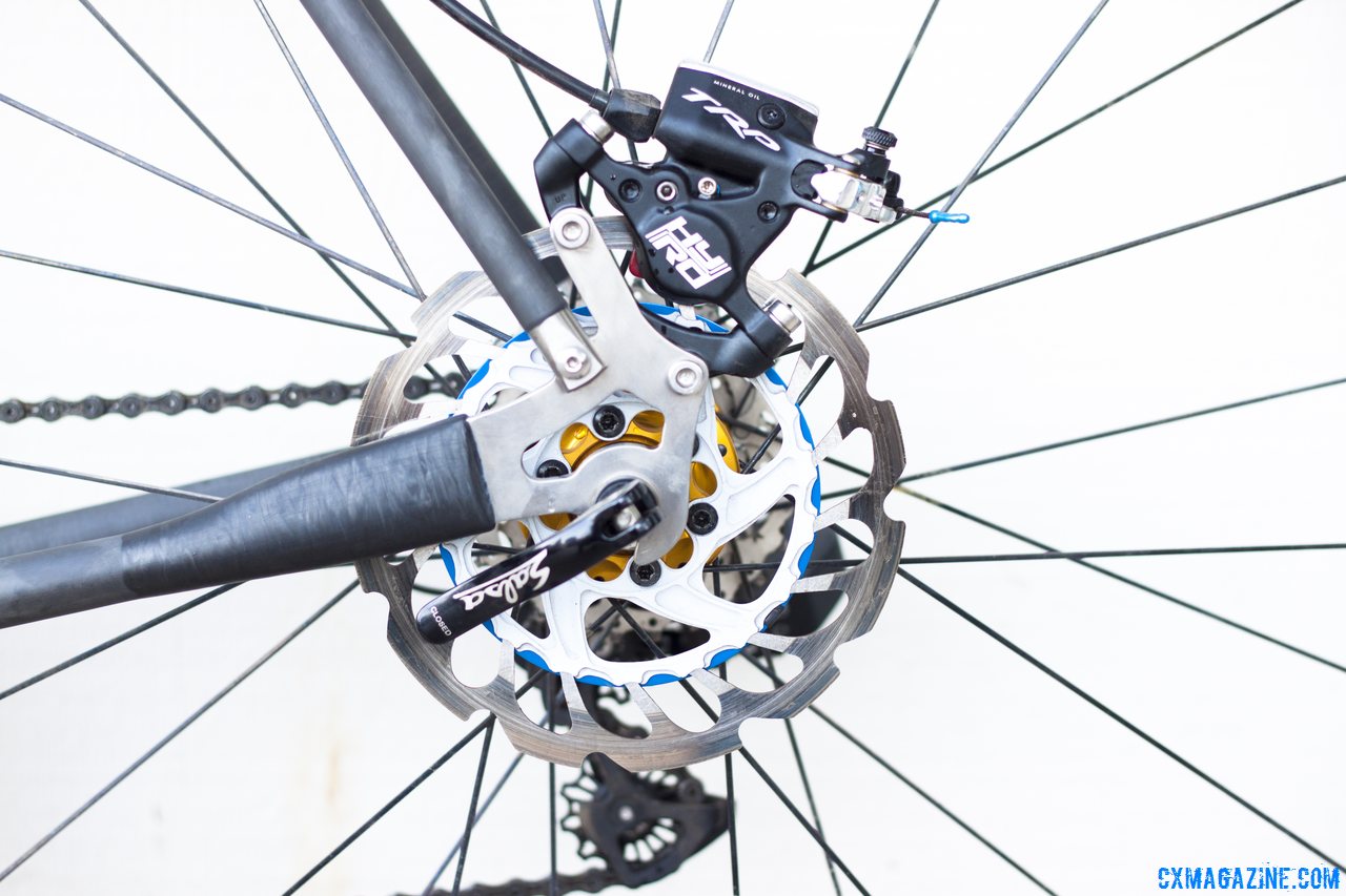 Titanium dropouts are made by Calfee and keep the weight low on the NAHBS Calfee Manta CX Prototype. Scrub MMC rotor, TRP HyRd hydraulic disc brake. © Cyclocross Magazine