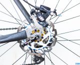 Titanium dropouts are made by Calfee and keep the weight low on the NAHBS Calfee Manta CX Prototype. Scrub MMC rotor, TRP HyRd hydraulic disc brake. © Cyclocross Magazine