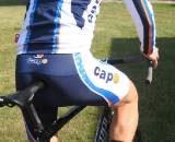 Capo bib shorts and long sleeve jersey with merino wool socks. by Kristie Hancock