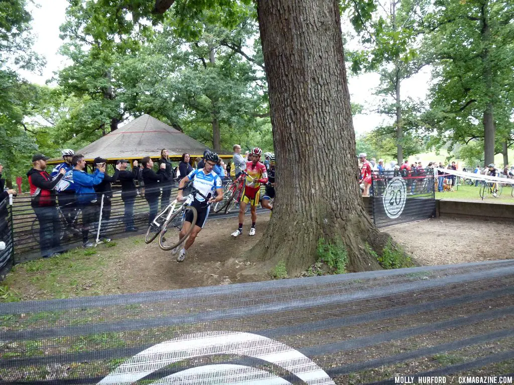Mike Garrigan leads into the tree barrier. Running around the tree barriers.  © Cyclocross Magazine