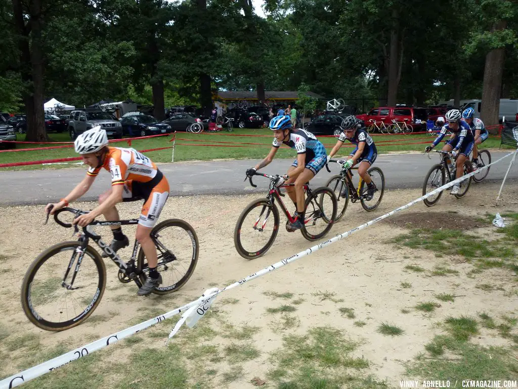 The chase group zooms through. © Vinny Agnello