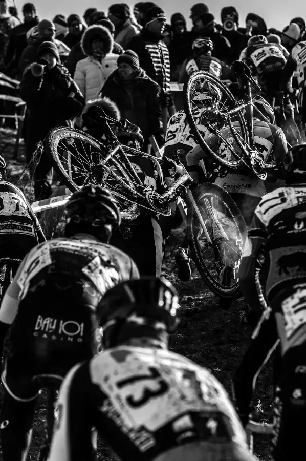 A scrum at the first dismount at the 2013 Cyclocross National Championships. © Chris Schmidt