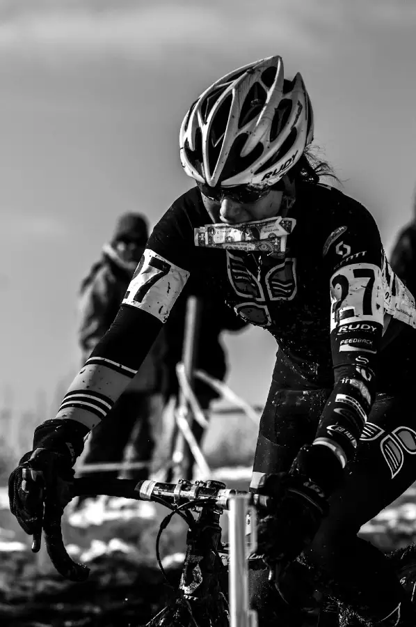 A rider grabs a handup at the 2013 Cyclocross National Championships. © Chris Schmidt