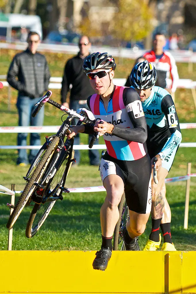 Jeremy Powers leads Ben Berden over the barriers. ©Jeffery Jakucyk